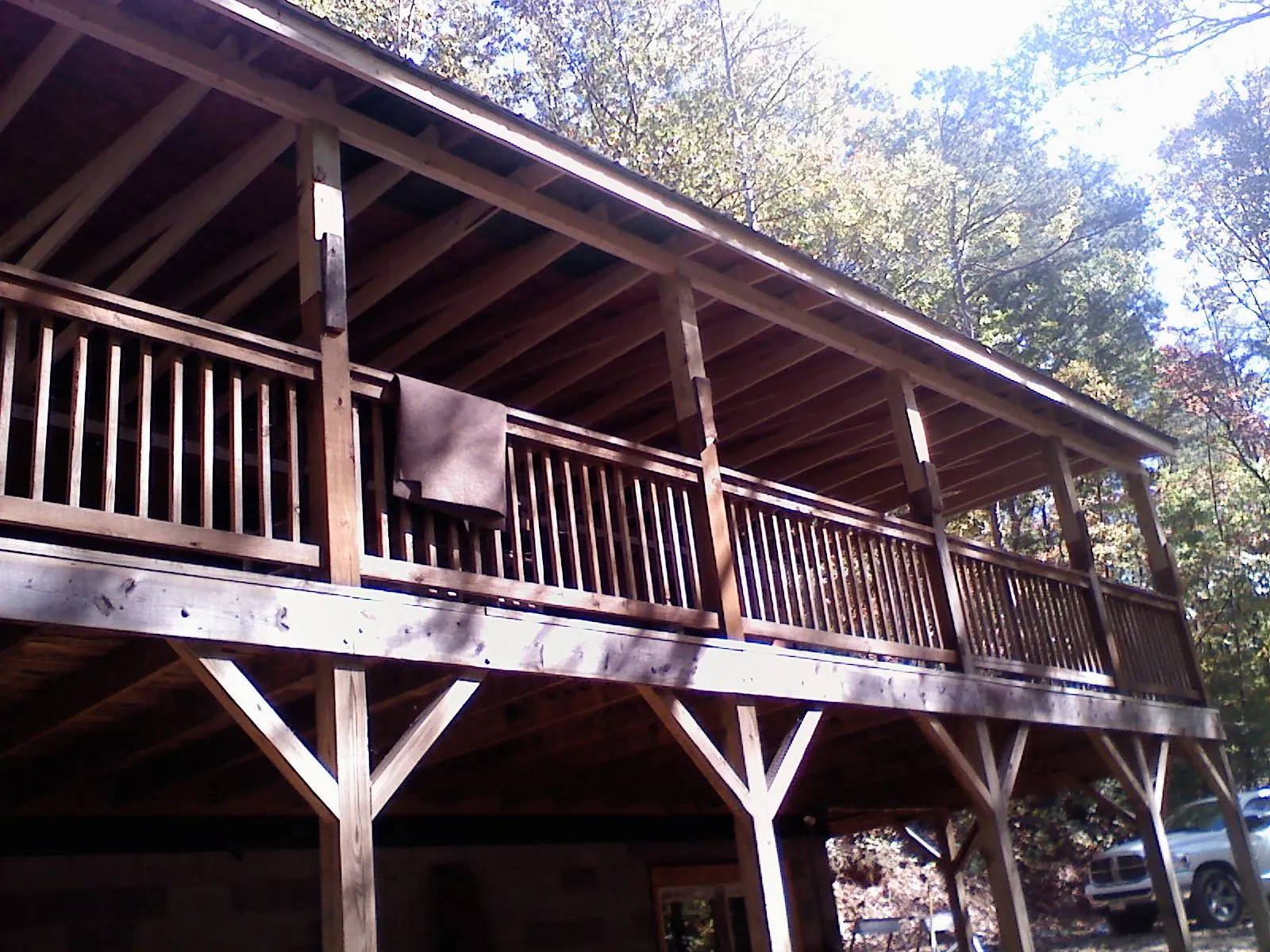 Timber framing under a new elevated porch and deck — Roof Leak Repair in Fostoria by Roofing Brothers